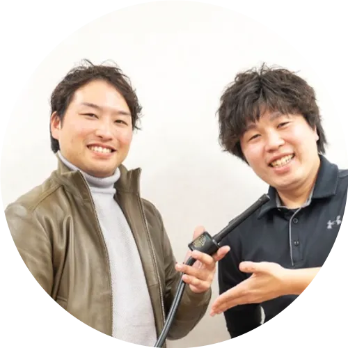 利用者と並ぶ整体師